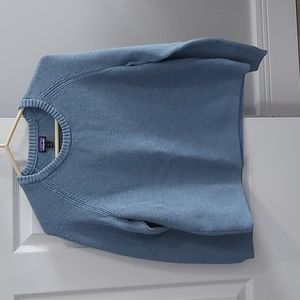 Patagonia light blue sweater.  100 % organic cotton exclusive of trum.